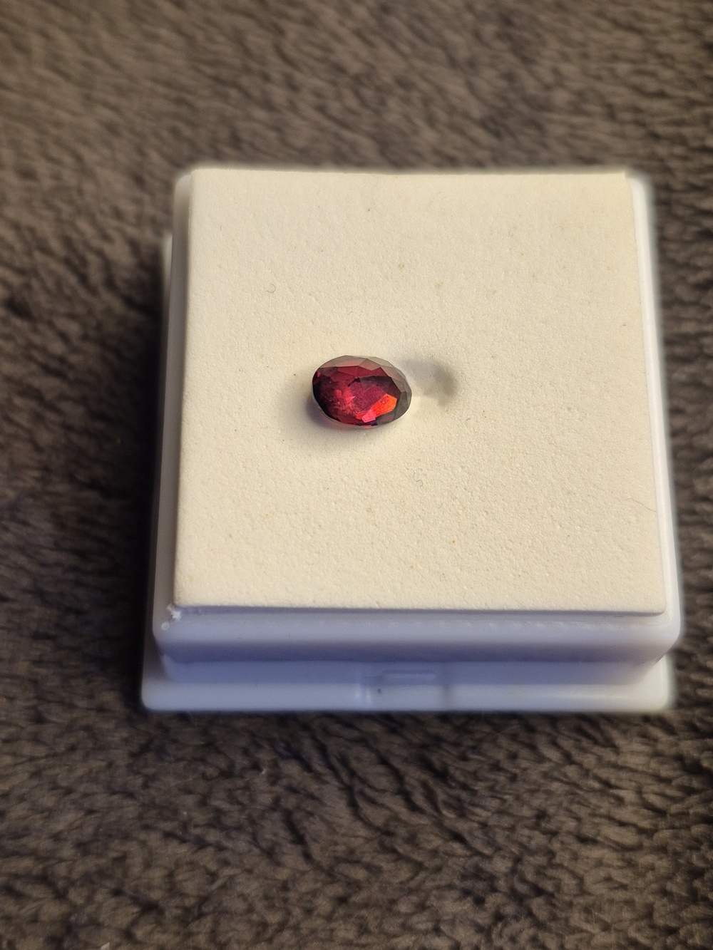 Red Zircon .95 ct oval 7x5 mm